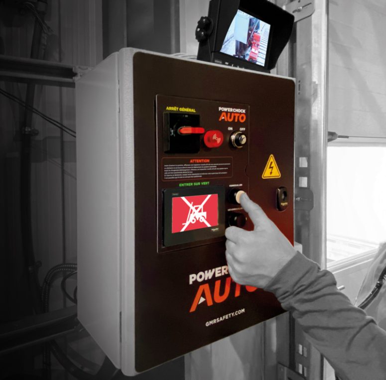 Warehouse operator pressing a button on the communication control box.